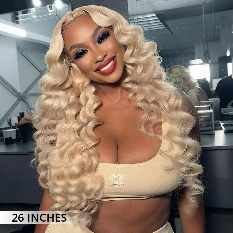 300% density blonde lace front wig made from 100% human hair with transparent lace, defined wavy texture and salon-quality fullness