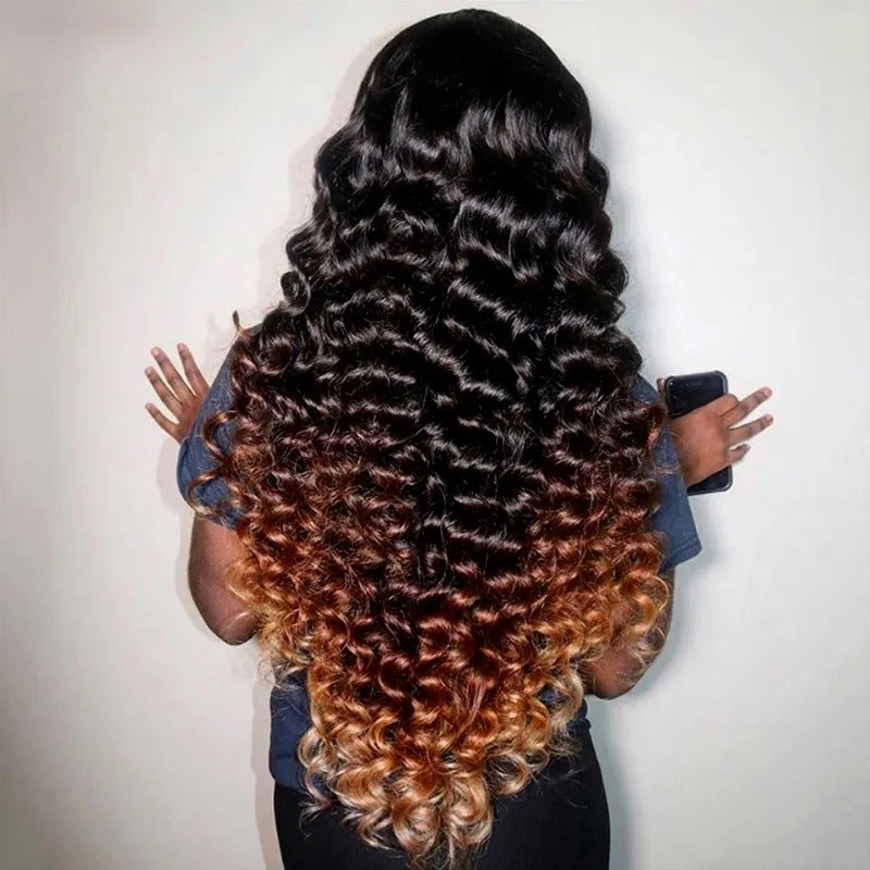 Brown to light auburn ombre wig color showing warm dimensional tones and blended highlights