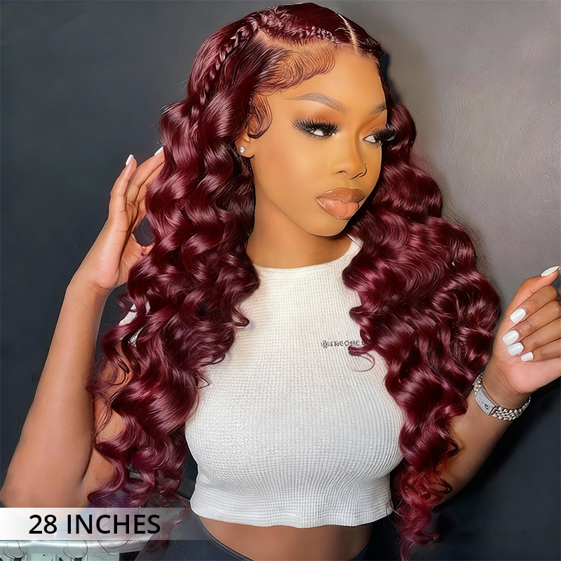 Burgundy loose deep wave wig side view with defined natural curls