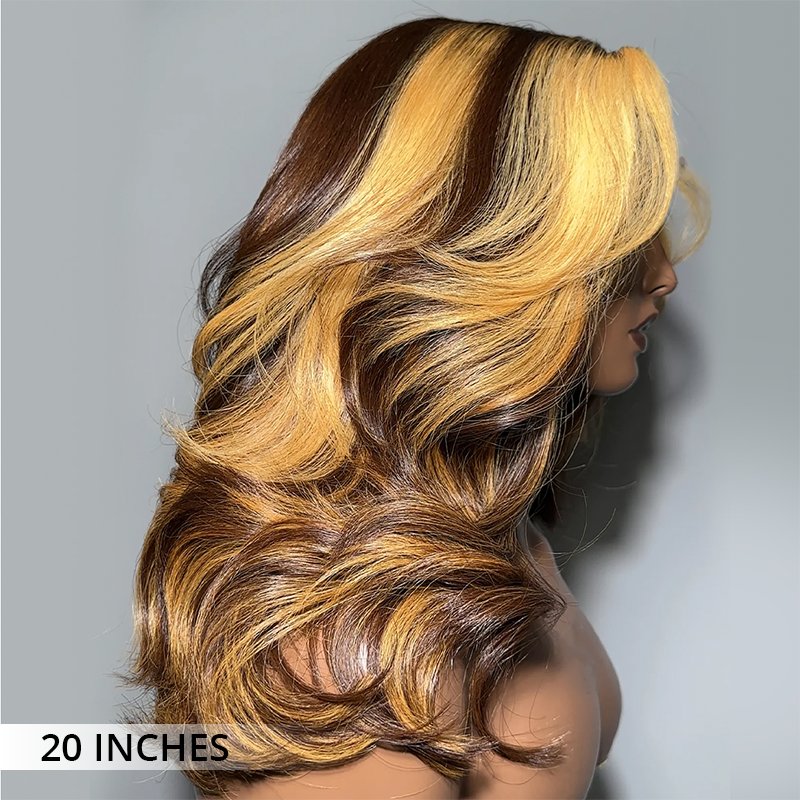 Layered bouncy curl human hair wig side view with blonde highlights