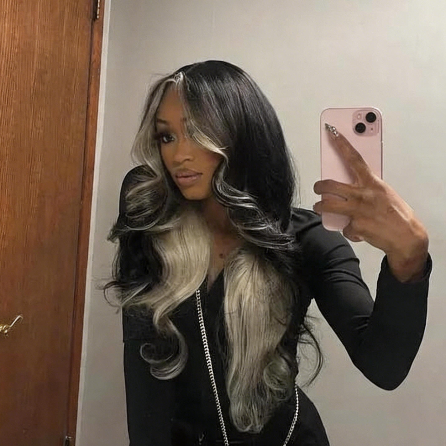 Layered body wave wig showing soft movement and natural hair texture
